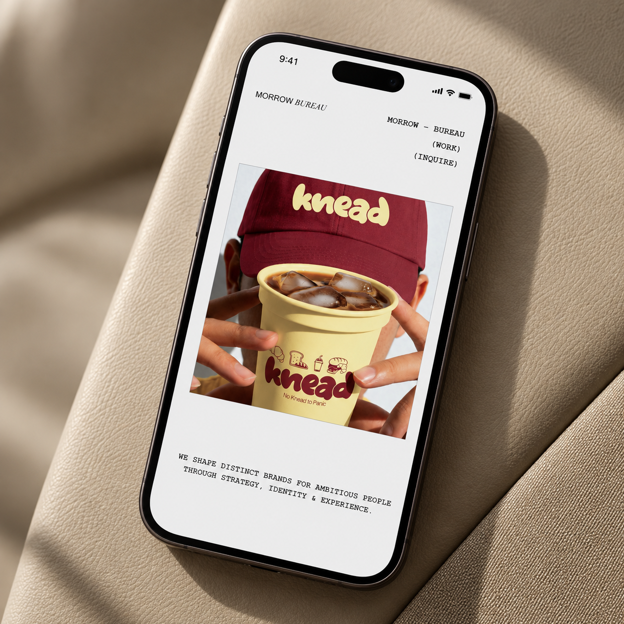 Morrow Bureau responsive portfolio homepage on a phone